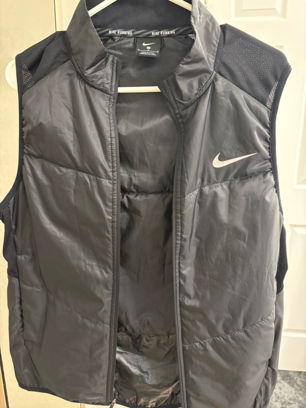 Nike Black Running Jacket with White Swoosh